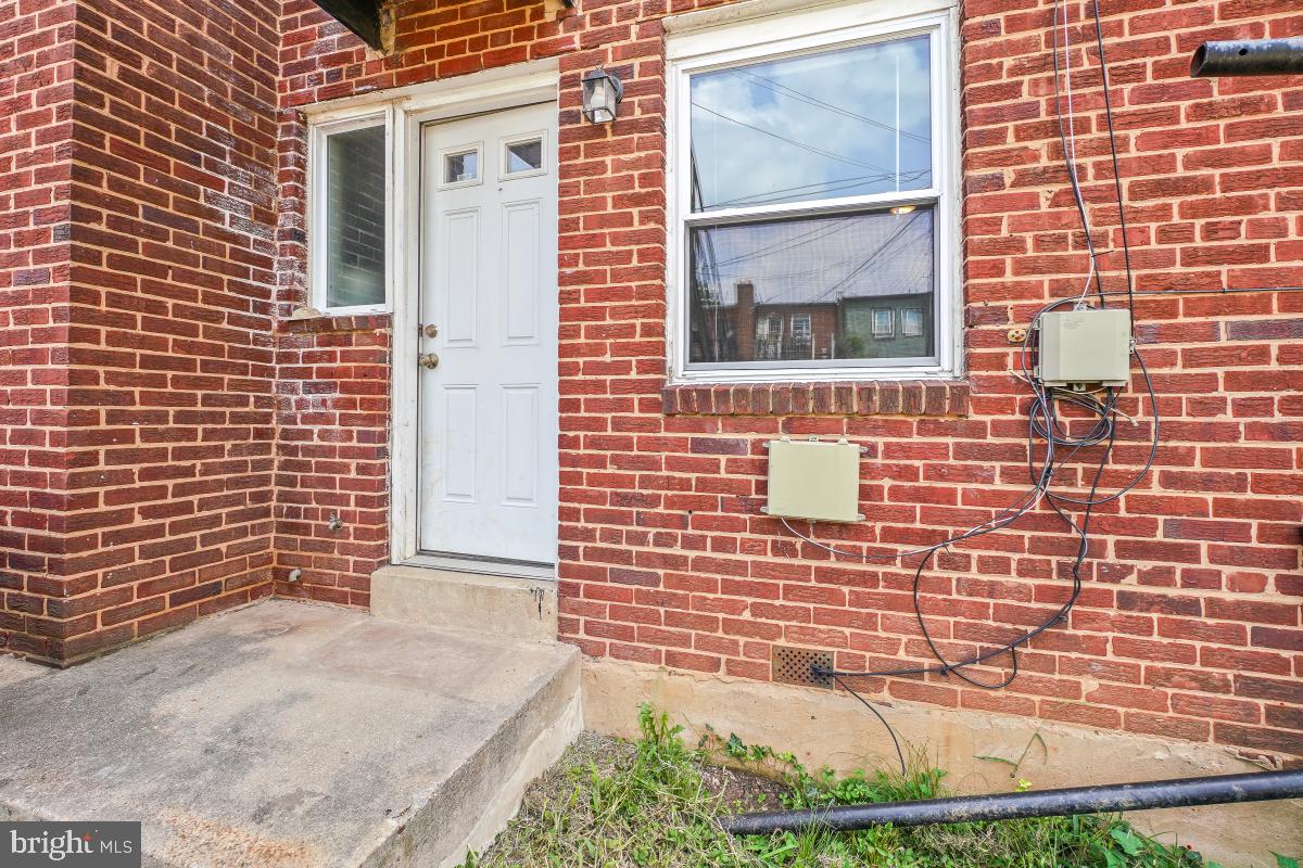 1280 16th Street Northeast Washington, DC 20002 - Photo 31 of 33 a view of a brick house with a street