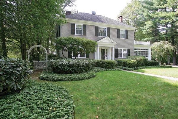 63 Neshobe Road Newton, MA 02462 - Photo 1 of 8 a front view of a house with garden