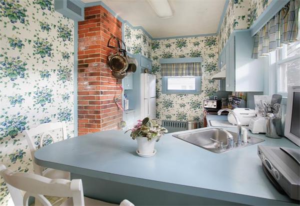 63 Neshobe Road Newton, MA 02462 - Photo 6 of 8 a view of a dining room with furniture and a chandelier