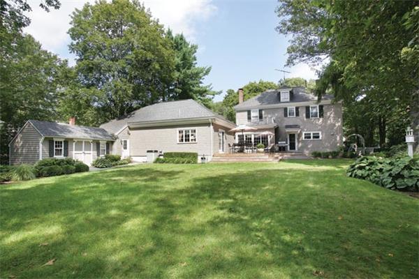 63 Neshobe Road Newton, MA 02462 - Photo 7 of 8 a front view of a house with a yard