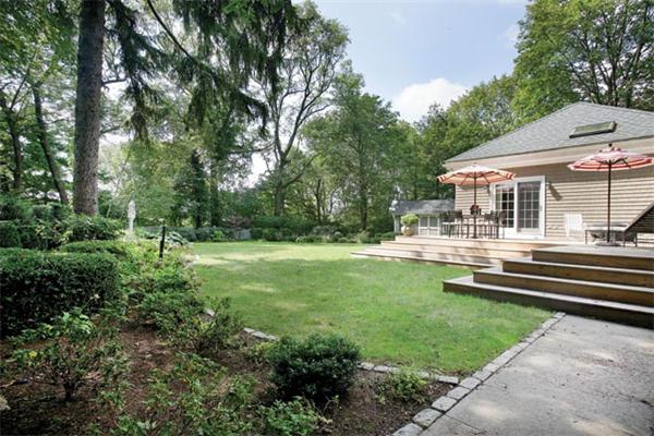 63 Neshobe Road Newton, MA 02462 - Photo 8 of 8 a view of house with garden and trees