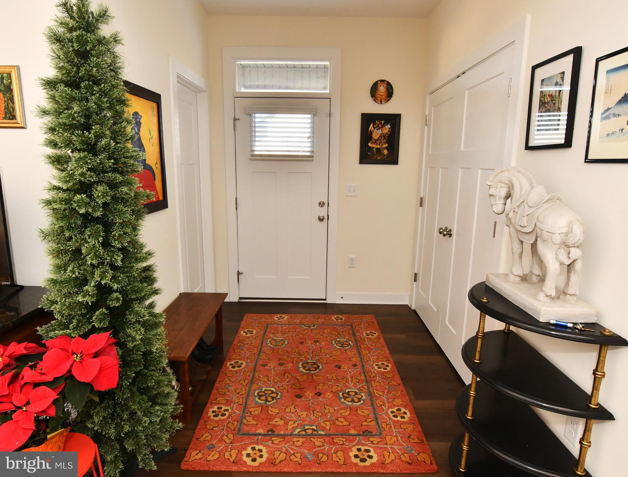 129 Doonbeg Court Winchester, VA 22602 - Photo 19 of 51 a view of a hallway to a livingroom with furniture