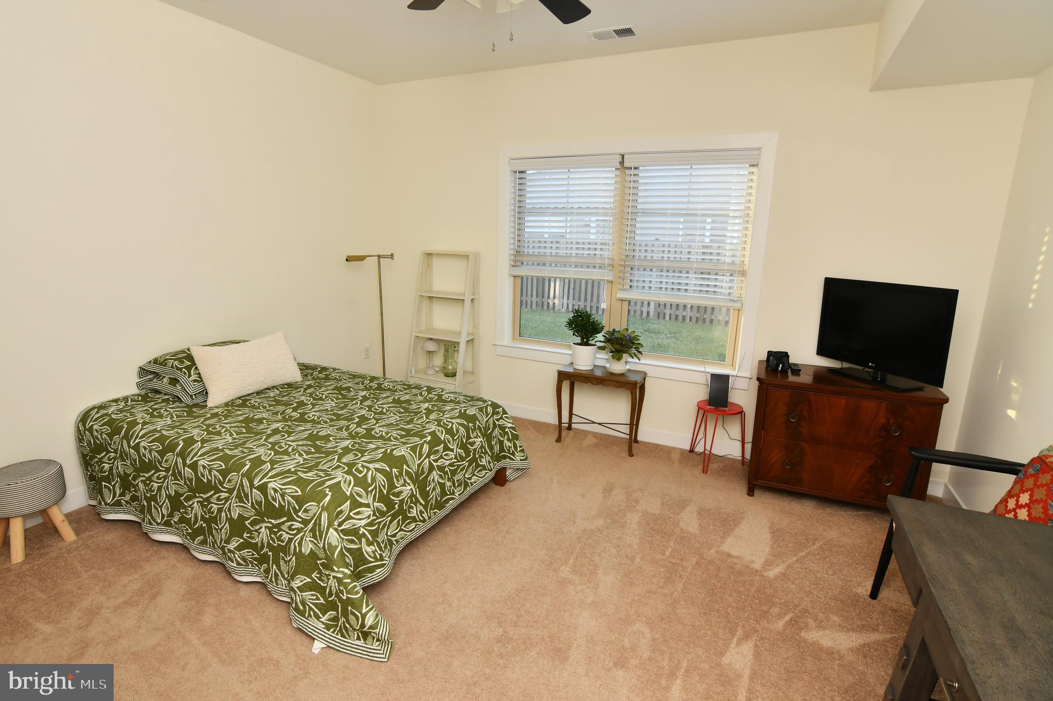 129 Doonbeg Court Winchester, VA 22602 - Photo 21 of 51 a bedroom with a bed and a television