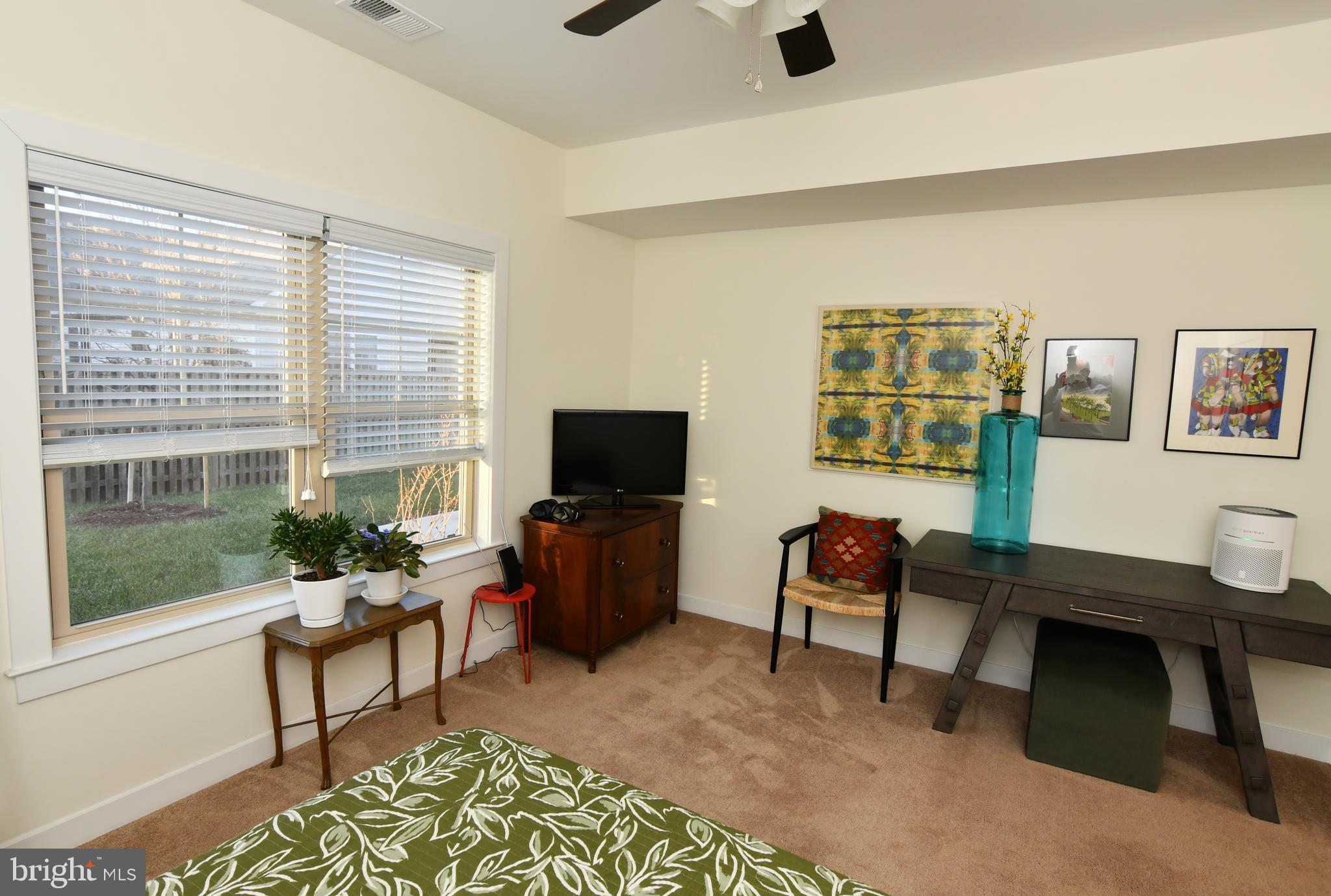 129 Doonbeg Court Winchester, VA 22602 - Photo 22 of 51 a living room with furniture a window and a flat screen tv