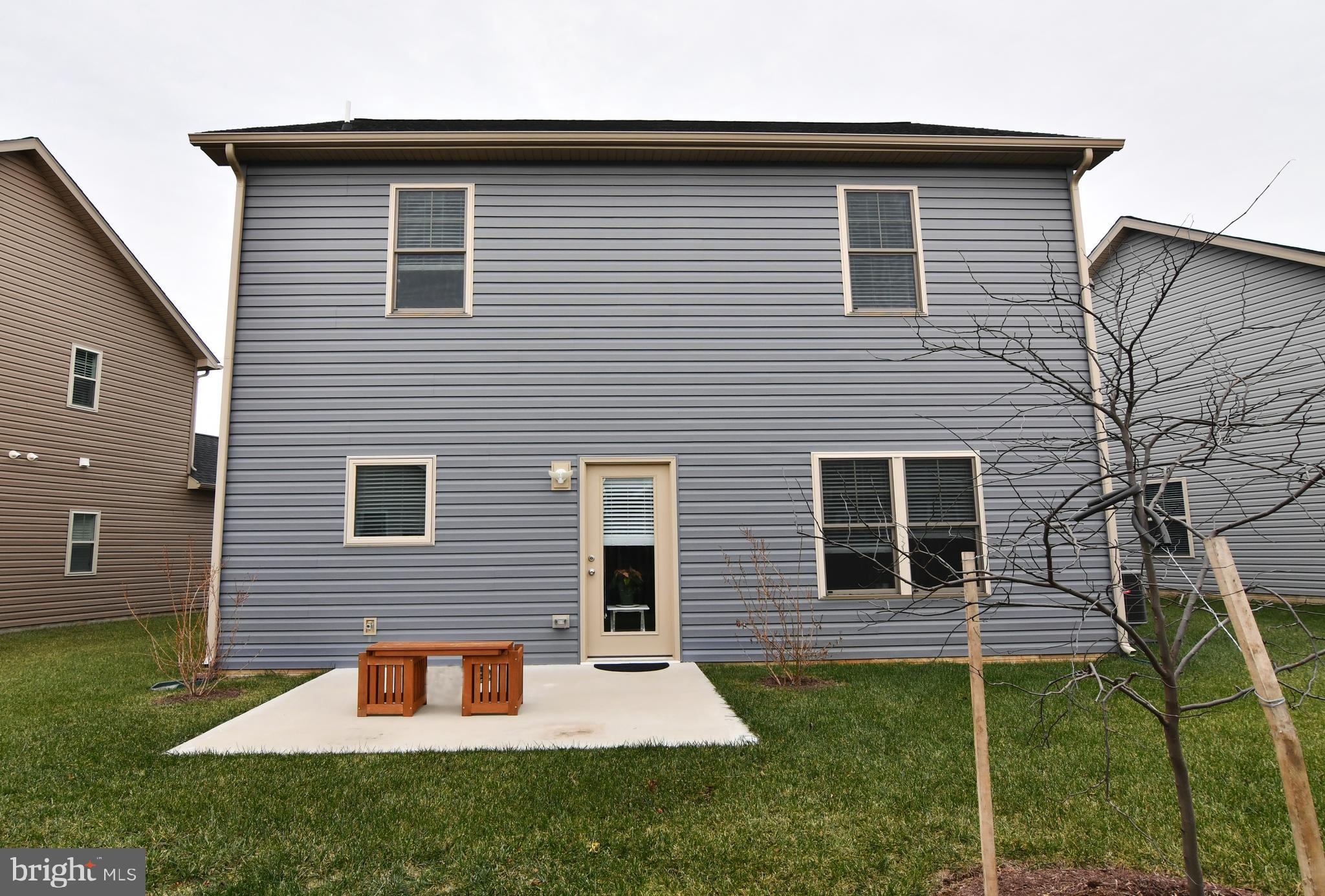 129 Doonbeg Court Winchester, VA 22602 - Photo 3 of 51 a front view of a house with a yard
