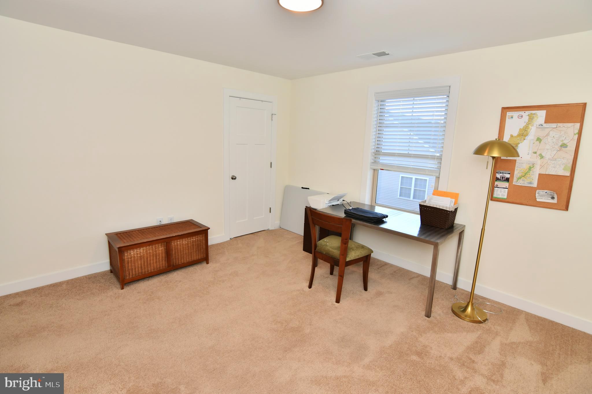 129 Doonbeg Court Winchester, VA 22602 - Photo 32 of 51 a room with furniture and a couch
