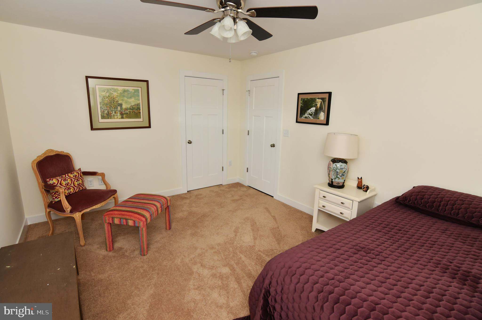 129 Doonbeg Court Winchester, VA 22602 - Photo 34 of 51 a bedroom with two beds and painting on the wall