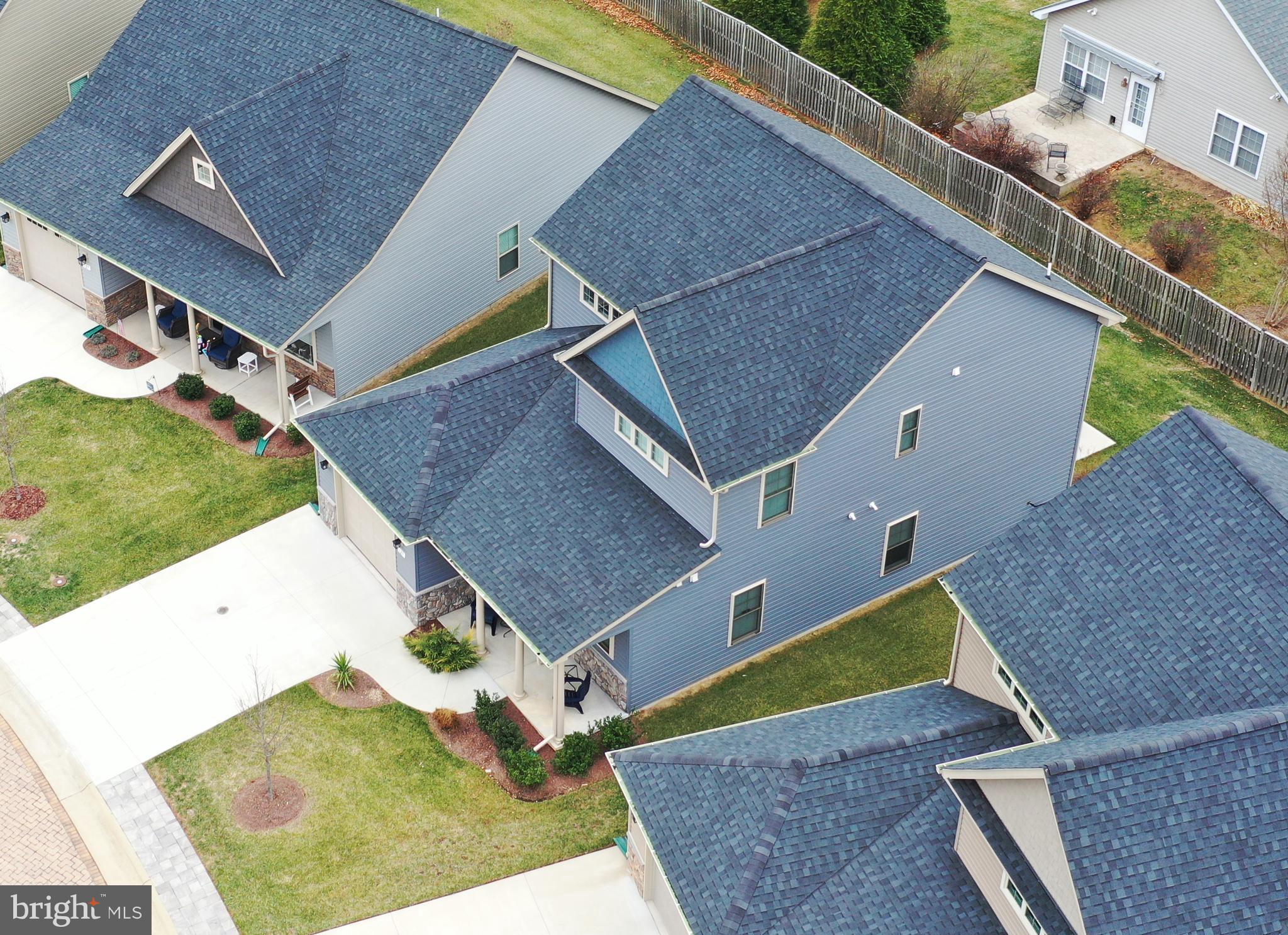 129 Doonbeg Court Winchester, VA 22602 - Photo 46 of 51 a view of a house with a backyard