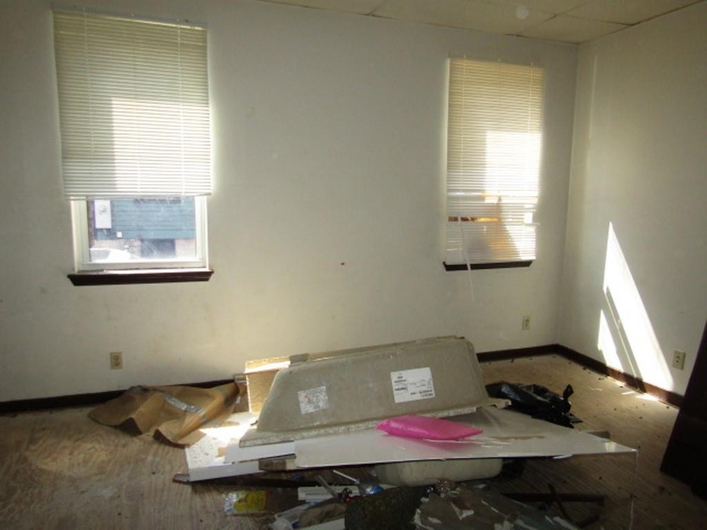 606 Middle Street Pittsburgh, PA 15212 - Photo 5 of 39 a living room with a couch and a table