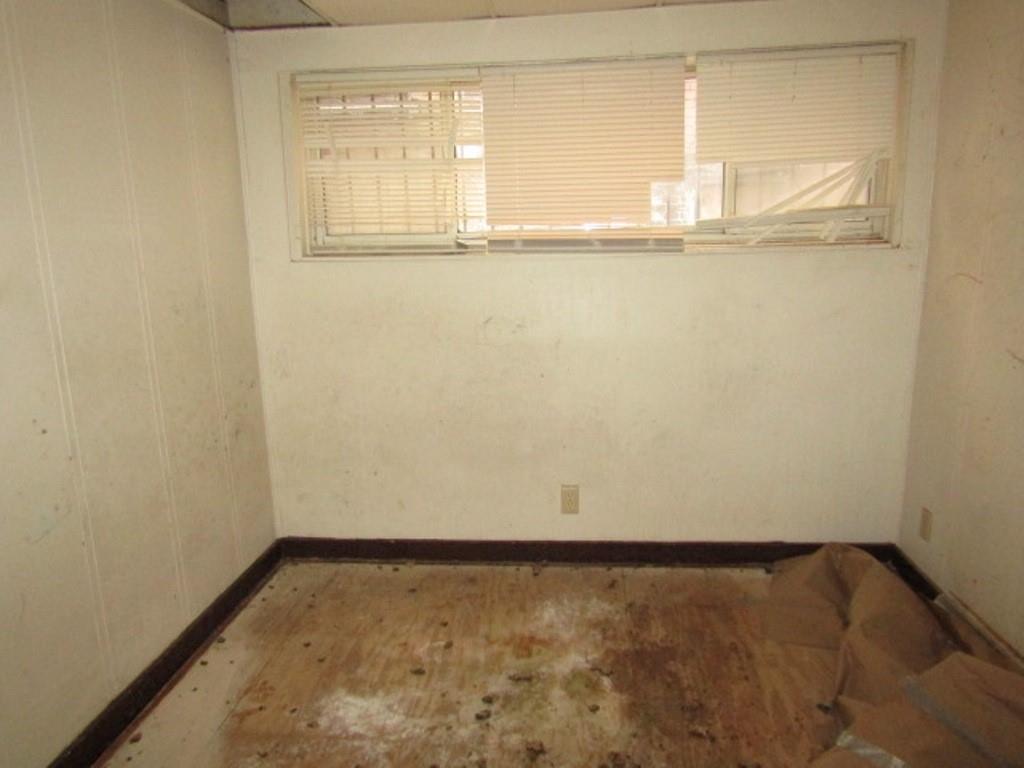 606 Middle Street Pittsburgh, PA 15212 - Photo 9 of 39 a view of a small space with wooden floor and a window