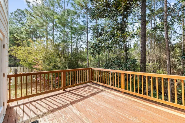 a view of a backyard with a patio and fire pit