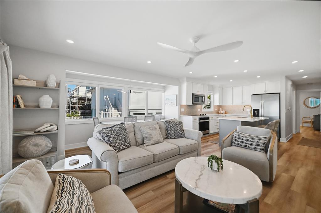 380 Gulf Boulevard, Unit 1 Boca Grande, FL 33921 - Photo 13 of 35 a living room with furniture and view of kitchen
