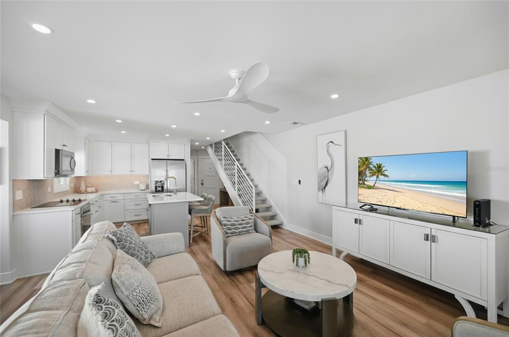 380 Gulf Boulevard, Unit 1 Boca Grande, FL 33921 - Photo 14 of 35 a living room with furniture and a table