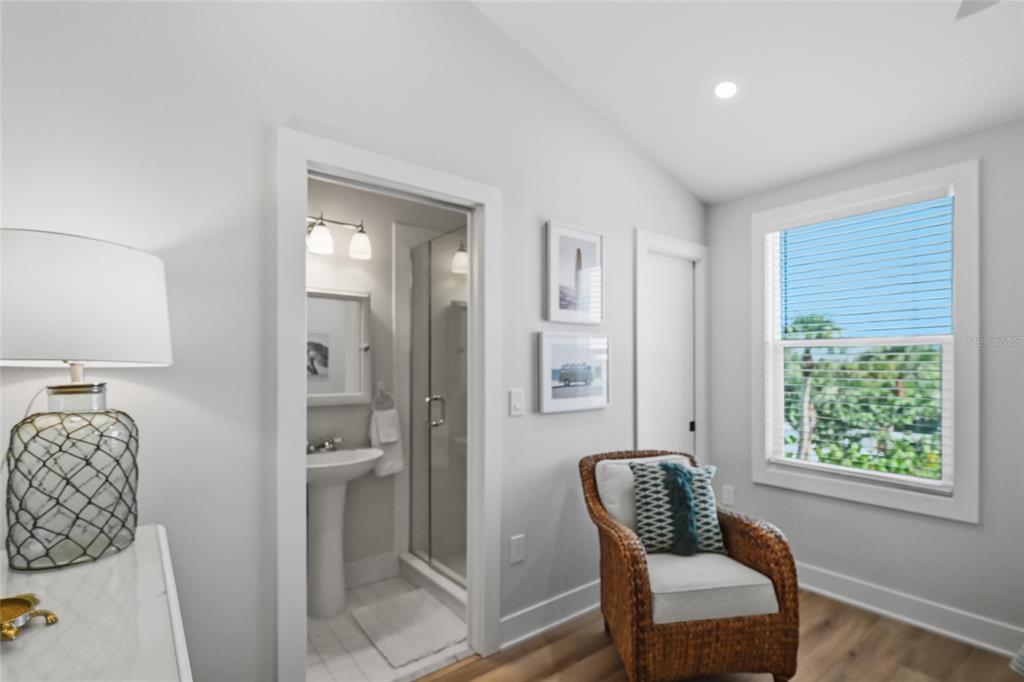 380 Gulf Boulevard, Unit 1 Boca Grande, FL 33921 - Photo 27 of 35 a living room with furniture and a window