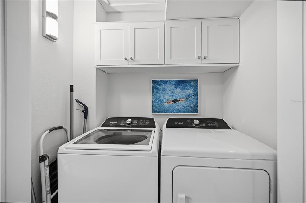 380 Gulf Boulevard, Unit 1 Boca Grande, FL 33921 - Photo 35 of 35 a utility room with dryer and washer