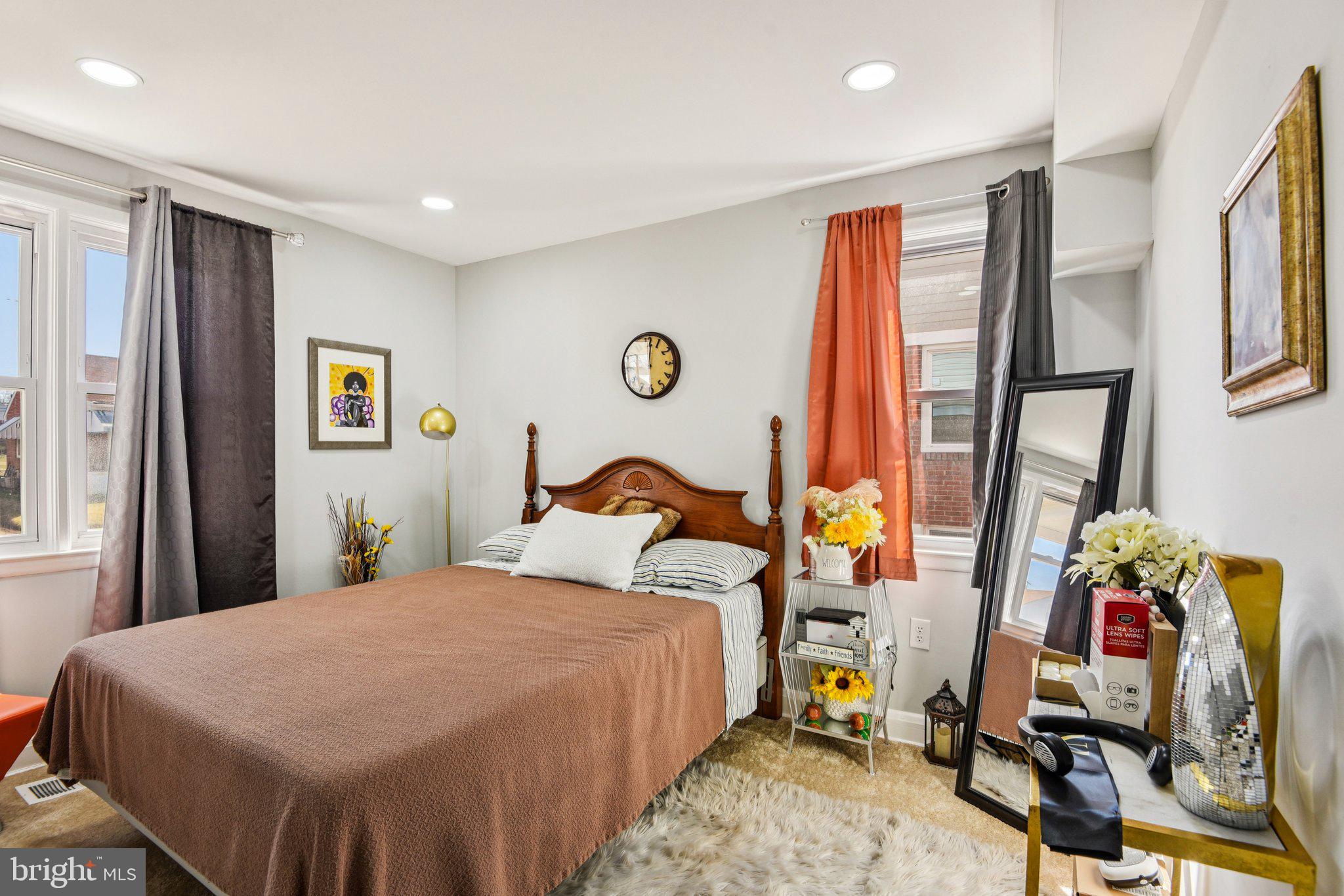 7004 Arion Road Baltimore, MD 21234 - Photo 12 of 43 a bedroom with bed and a window