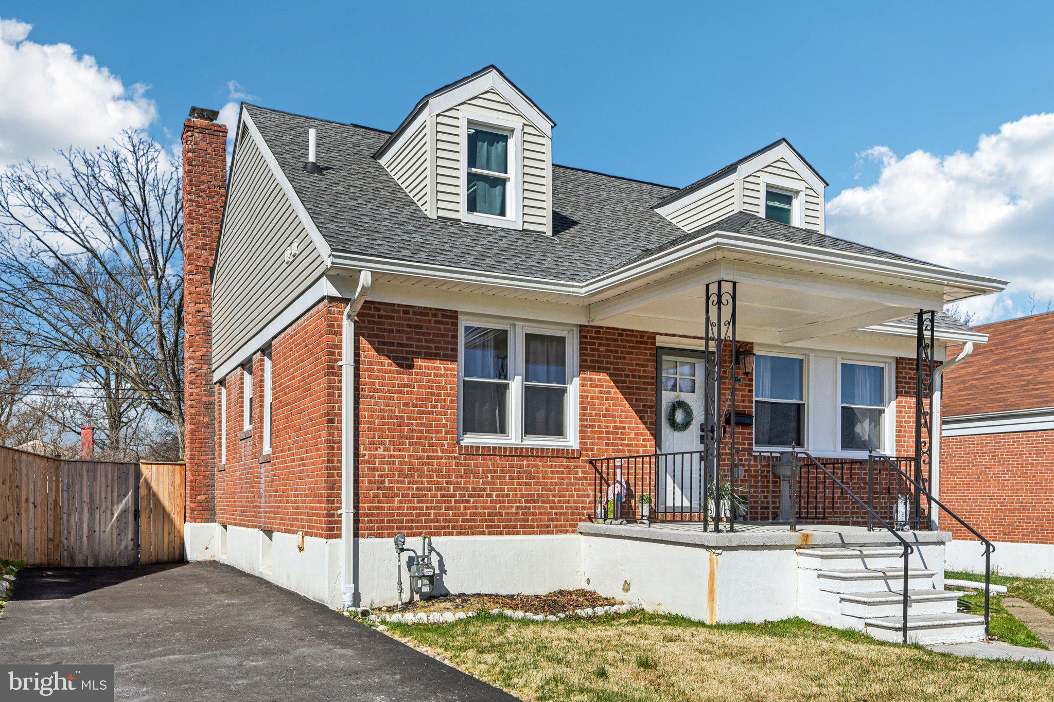 7004 Arion Road Baltimore, MD 21234 - Photo 2 of 43 a front view of a house with garden