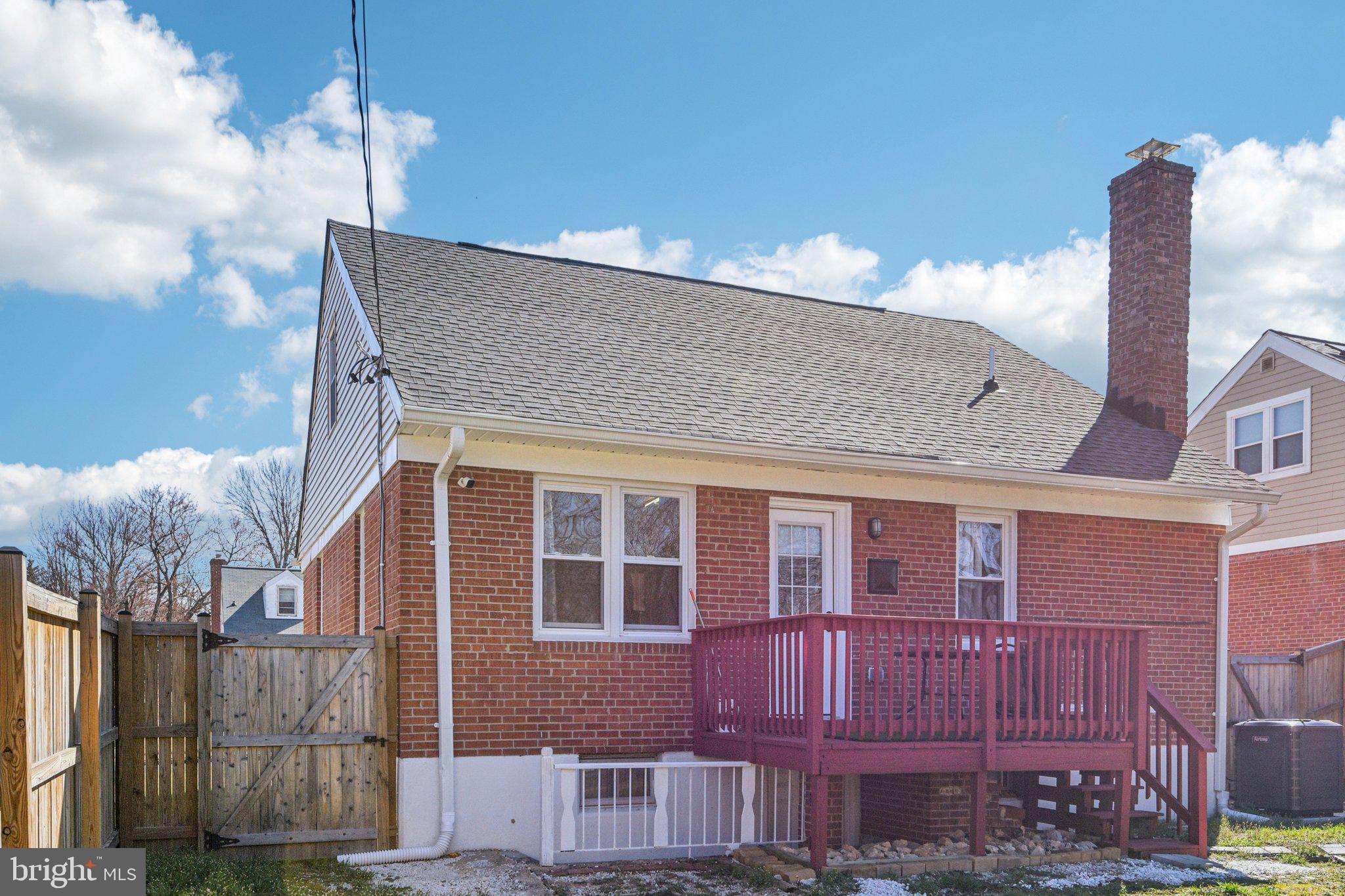 7004 Arion Road Baltimore, MD 21234 - Photo 37 of 43 a front view of a house with a yard