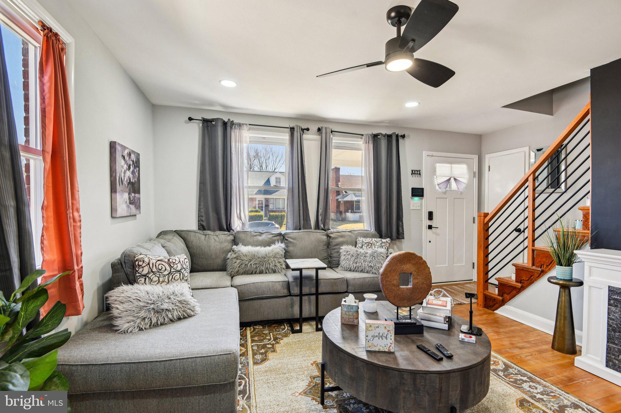 7004 Arion Road Baltimore, MD 21234 - Photo 5 of 43 a living room with furniture and a large window