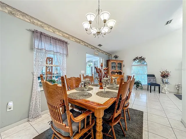 a kitchen with a stove a sink and a microwave