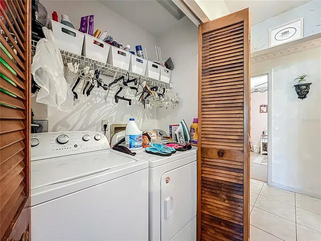 an aerial view of a house with a swimming pool