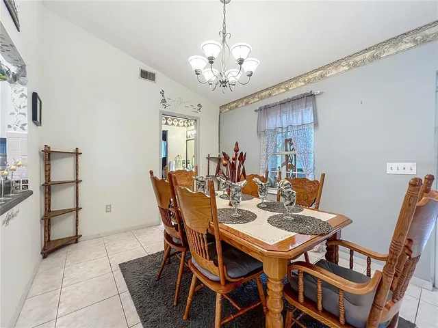 a kitchen with a sink cabinets and appliances
