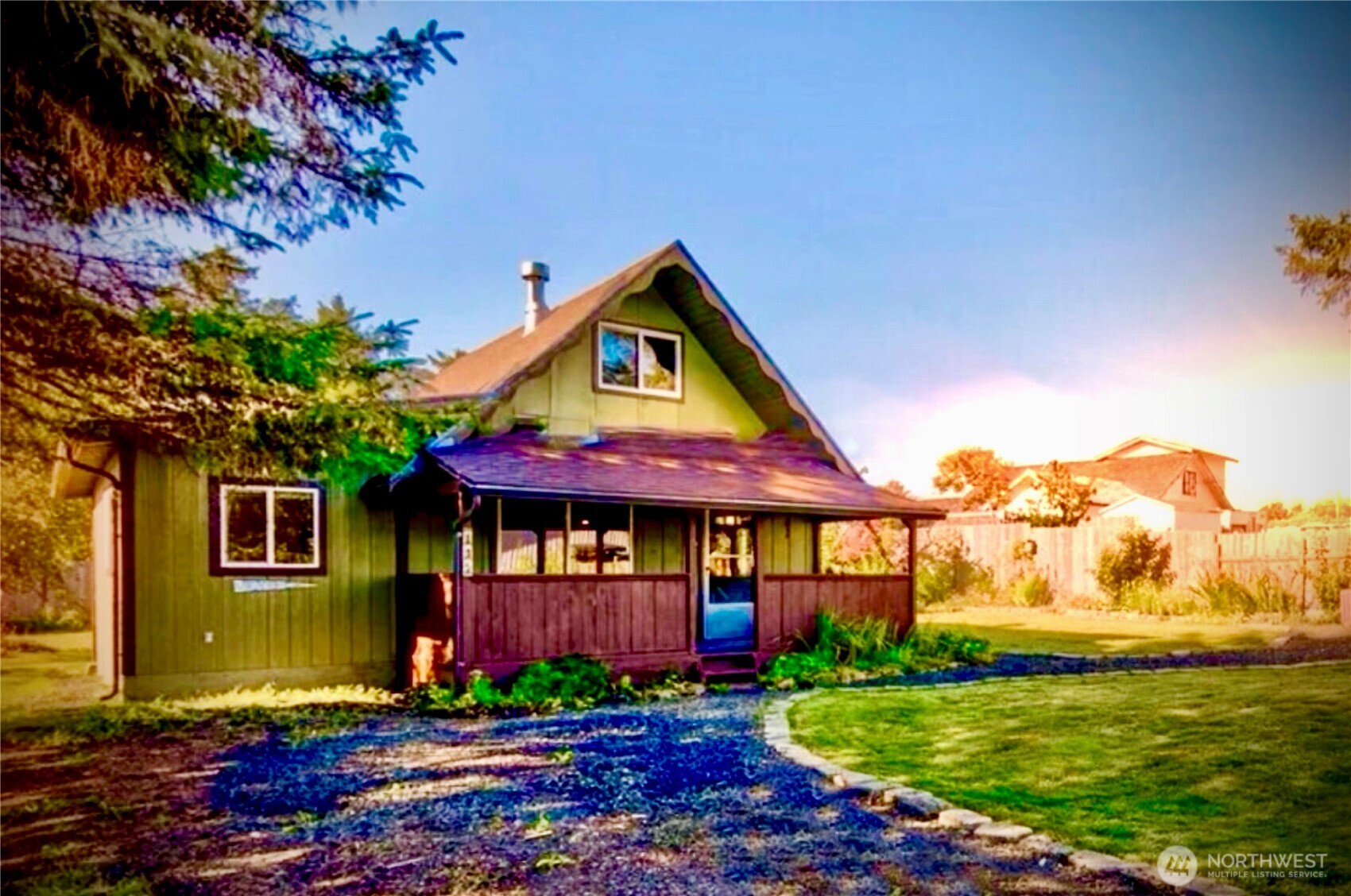 845 Schmid Road Grayland, WA 98547 - Photo 1 of 1 a front view of a house with garden