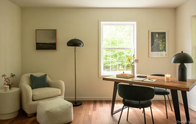 a living room with furniture and a window