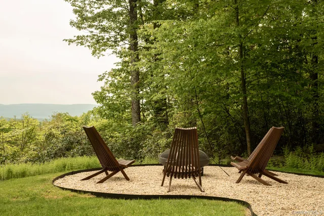 a view of a swimming pool with a slide