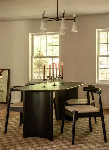 a bathroom with a sink and a window