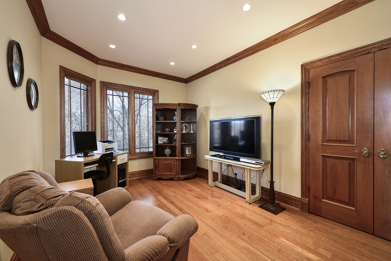 10 Carnoustie Lane Inverness, IL 60067 - Photo 15 of 44 a living room with furniture and a flat screen tv