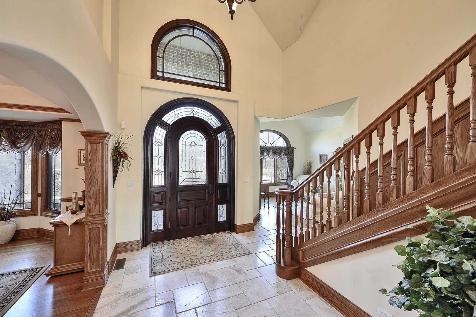 10 Carnoustie Lane Inverness, IL 60067 - Photo 2 of 44 a view of entryway with stairs and a garden