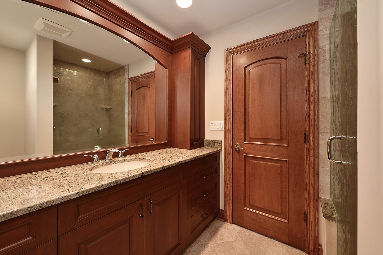 10 Carnoustie Lane Inverness, IL 60067 - Photo 21 of 44 a bathroom with a granite countertop sink and a mirror
