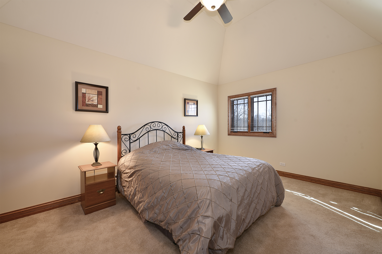 10 Carnoustie Lane Inverness, IL 60067 - Photo 25 of 44 a bedroom with a bed and a night stand