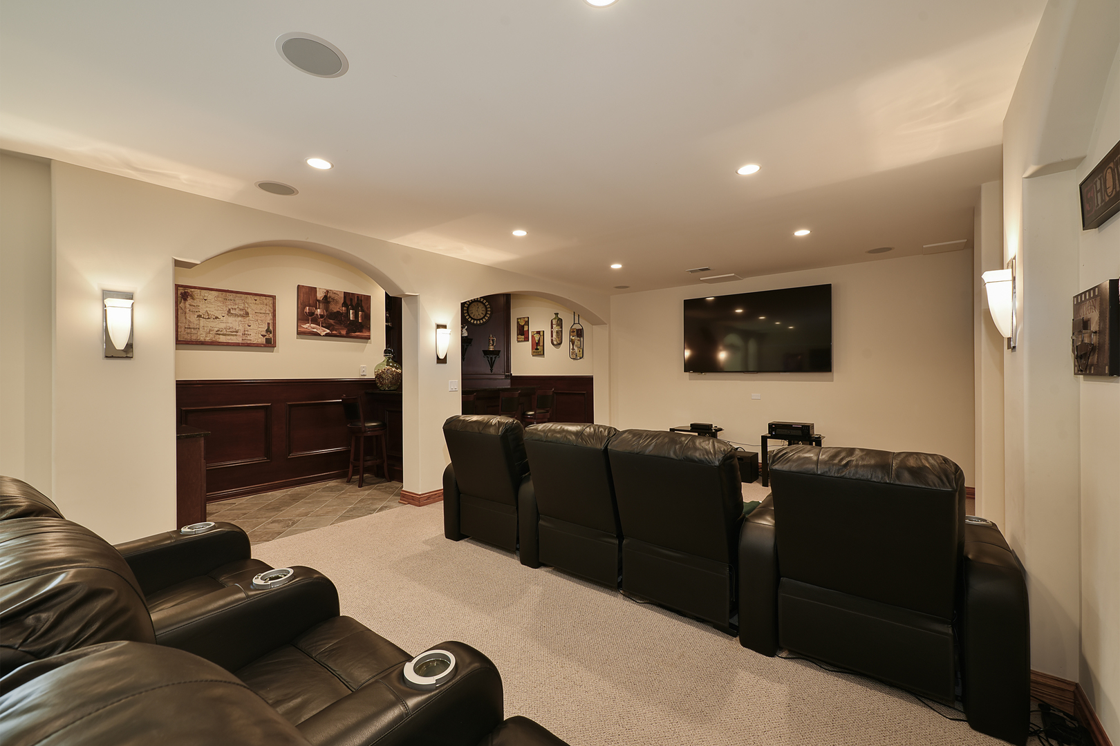 10 Carnoustie Lane Inverness, IL 60067 - Photo 26 of 44 a living room with furniture and a flat screen tv