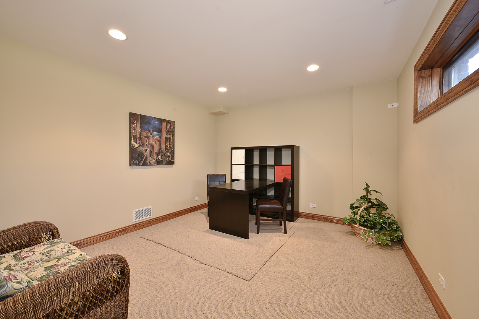 10 Carnoustie Lane Inverness, IL 60067 - Photo 34 of 44 a bedroom with a bed and a couch