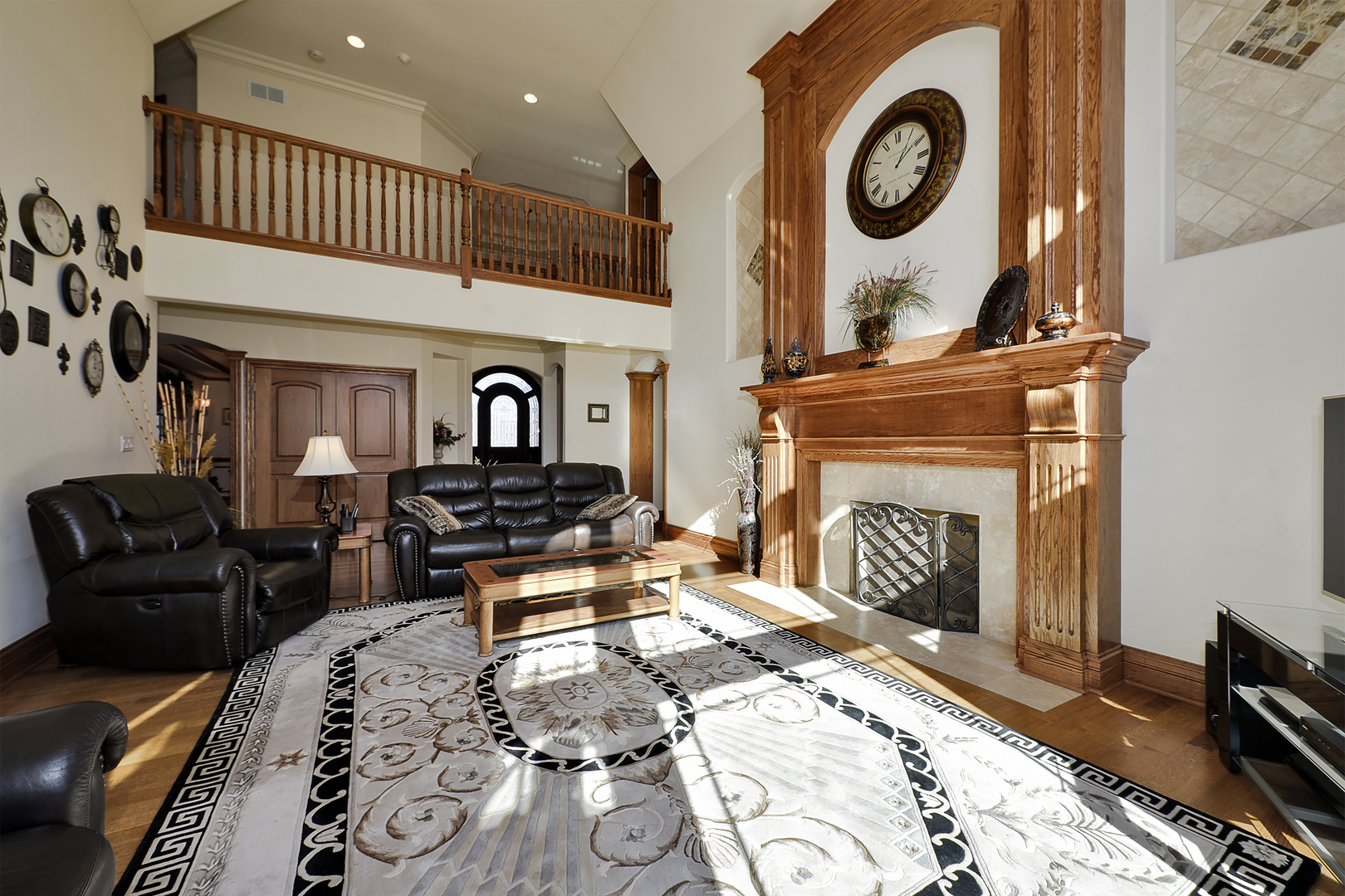 10 Carnoustie Lane Inverness, IL 60067 - Photo 4 of 44 a living room with furniture a clock and a fireplace