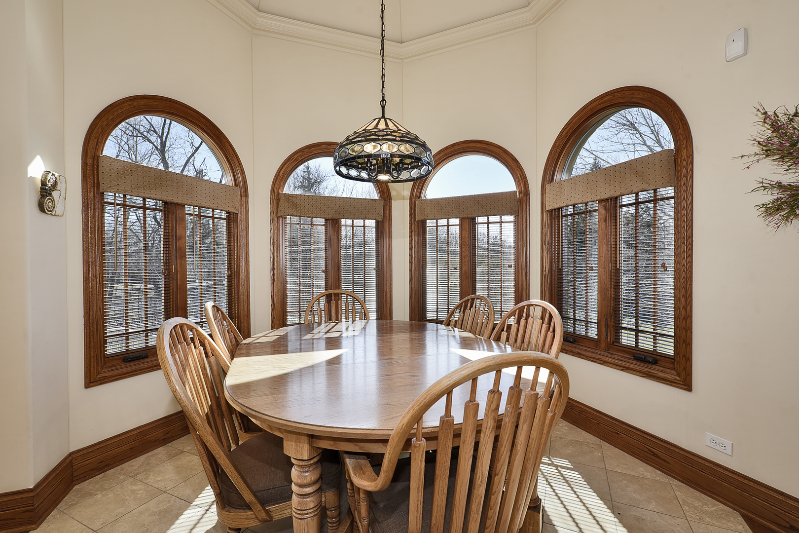 10 Carnoustie Lane Inverness, IL 60067 - Photo 8 of 44 a view of a dining room with furniture window and outside view