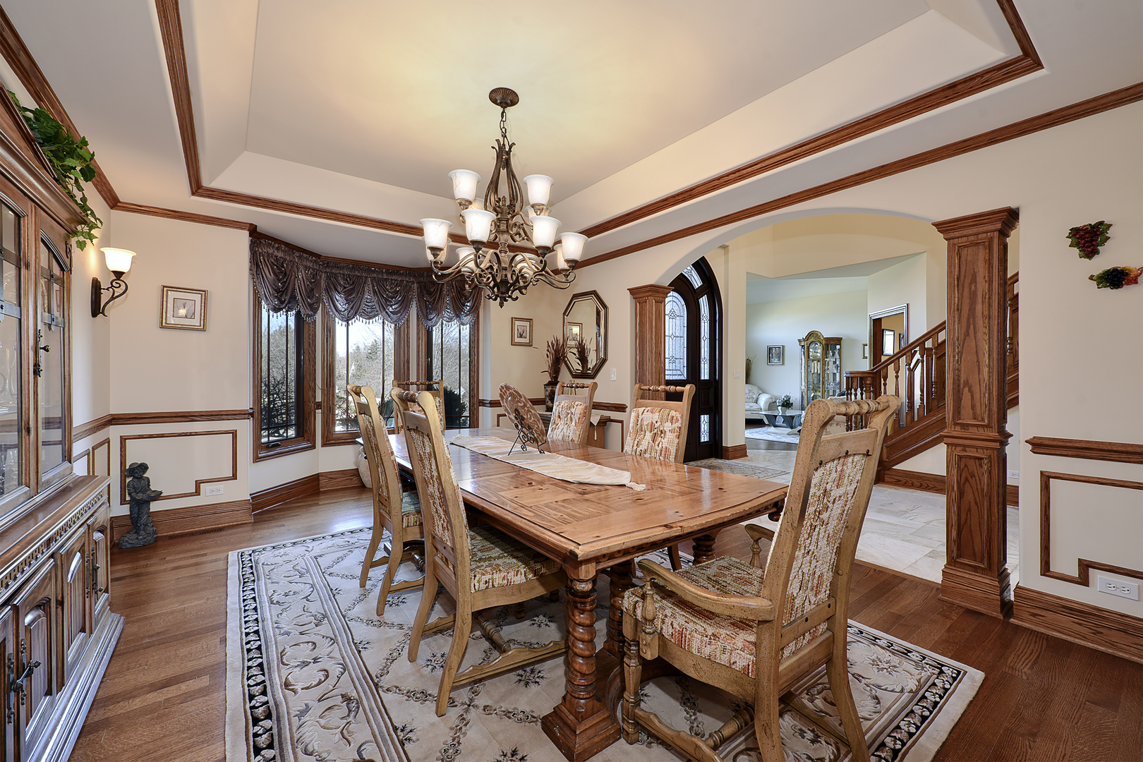 10 Carnoustie Lane Inverness, IL 60067 - Photo 9 of 44 a view of a dining room with furniture and wooden floor