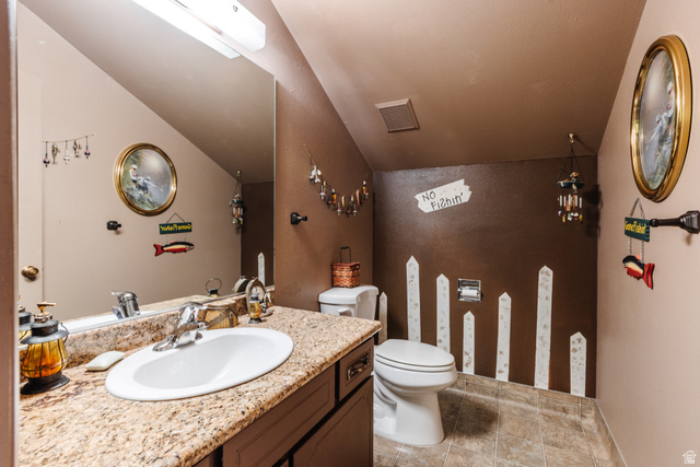 1470 Redwood Tree Street St. George, UT 84790 - Photo 33 of 53 Bathroom featuring a vanity with a granite-style countertop, undermount sink, and chrome faucet