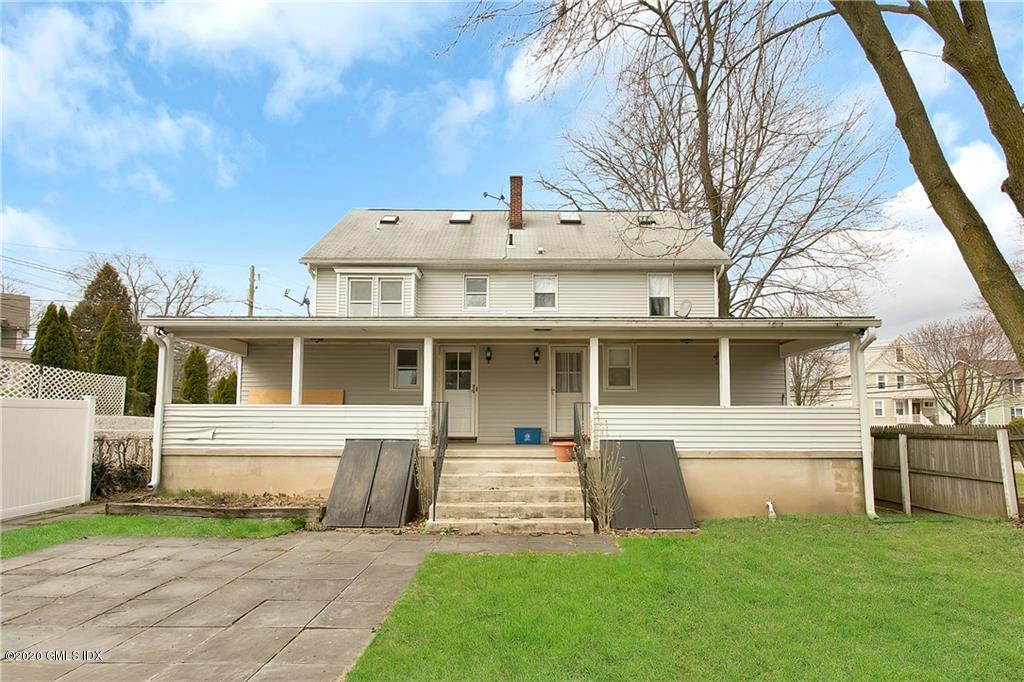 25 Valley Road, Unit 25 Cos Cob, CT 06807 - Photo 11 of 17 a view of a house with a yard and sitting area