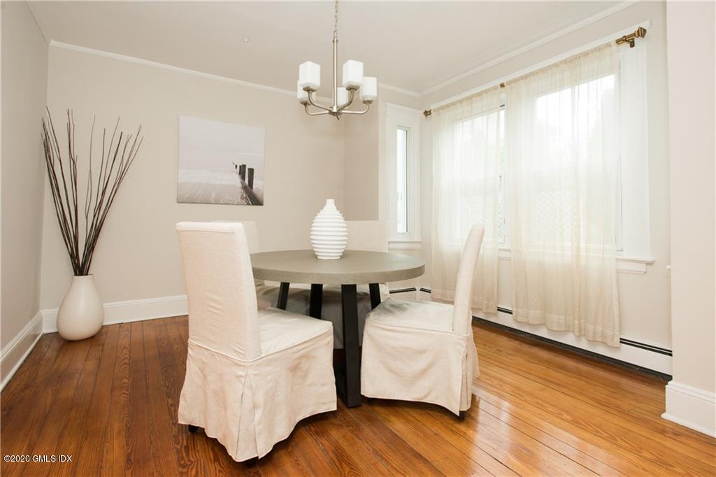 25 Valley Road, Unit 25 Cos Cob, CT 06807 - Photo 5 of 17 a living room with furniture and a wooden floor