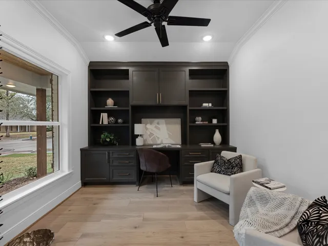 a bathroom with a granite countertop sink a toilet and shower
