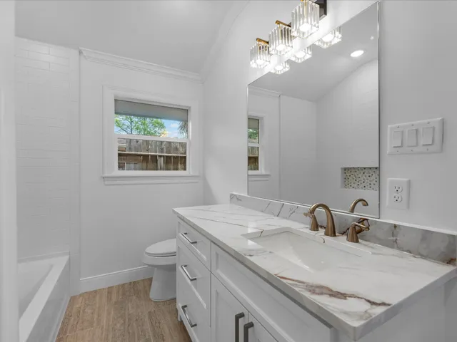 a front view of house with yard and outdoor seating