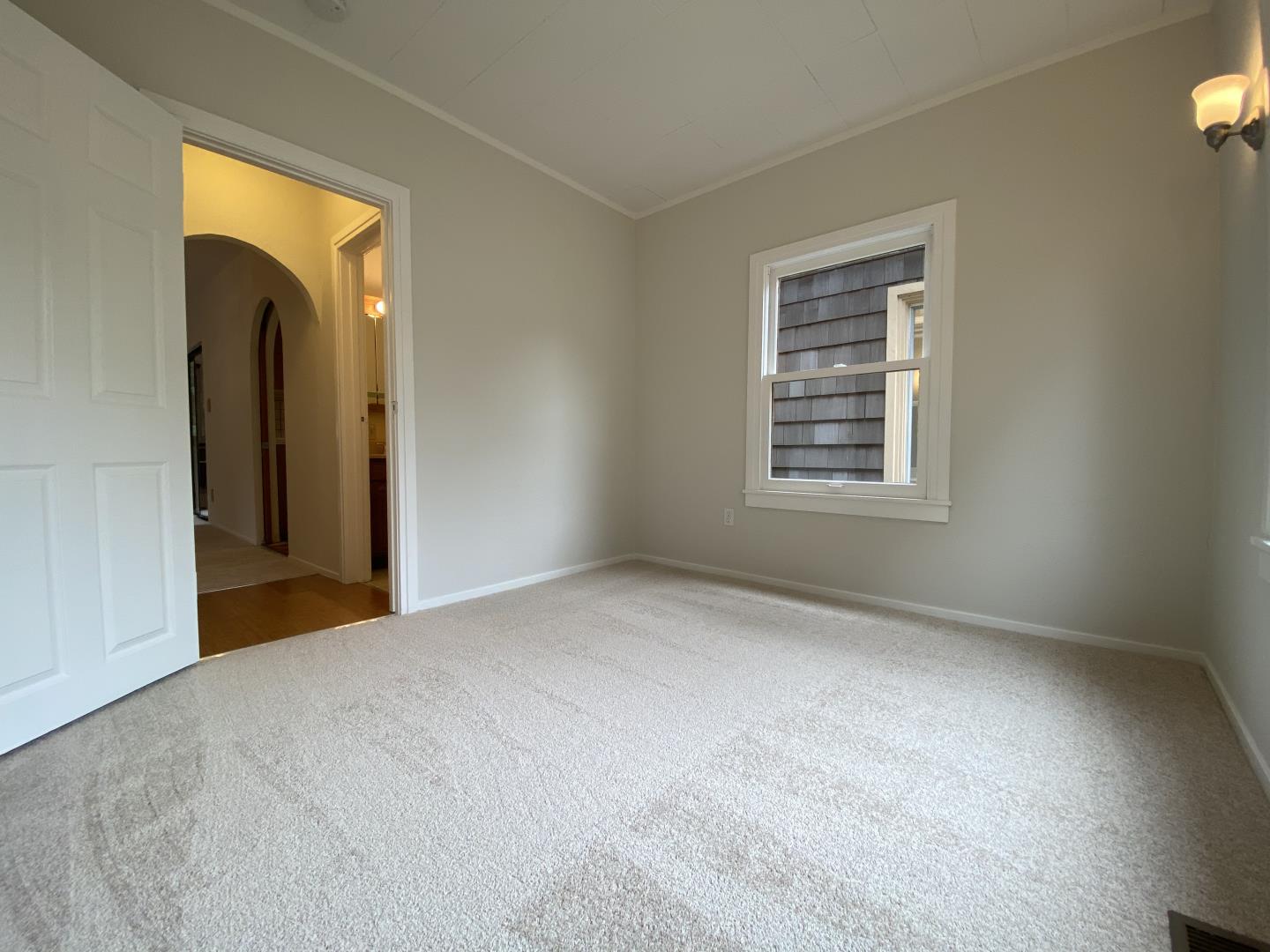 220 Minerva Avenue Pacifica, CA 94044 - Photo 12 of 22 a view of an empty room with a window