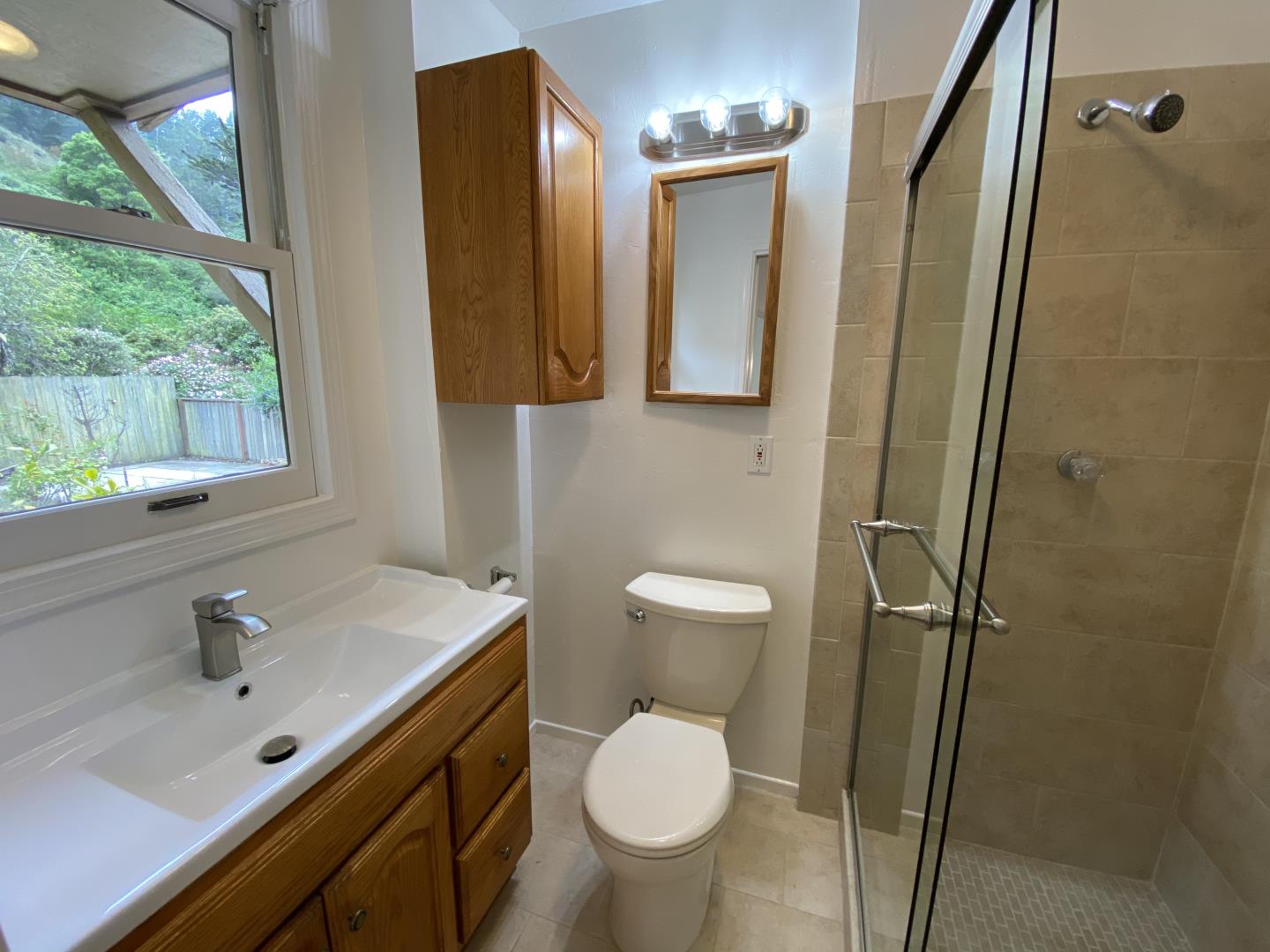 220 Minerva Avenue Pacifica, CA 94044 - Photo 16 of 22 a bathroom with a toilet sink and mirror