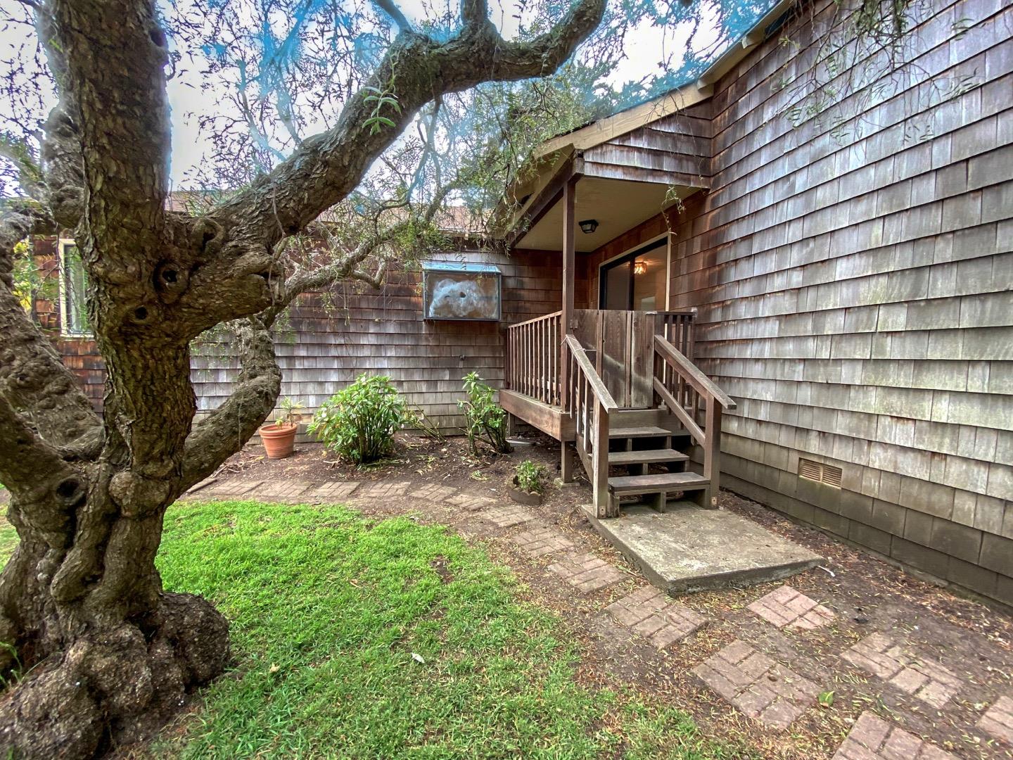 220 Minerva Avenue Pacifica, CA 94044 - Photo 21 of 22 a view of a house with a yard