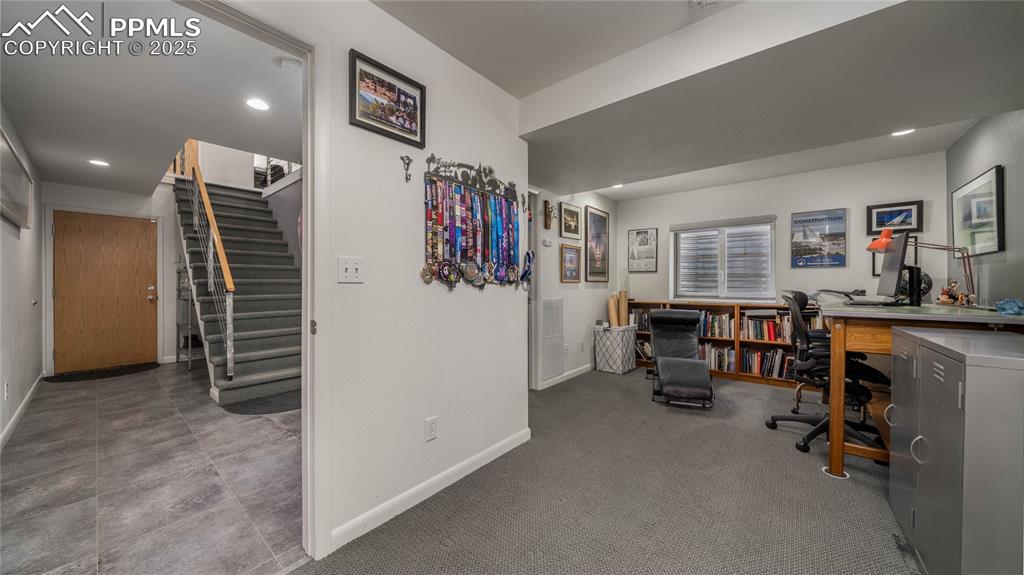 7550 Dairy Ranch Road Colorado Springs, CO 80919 - Photo 23 of 39 a view of a livingroom with furniture and windows