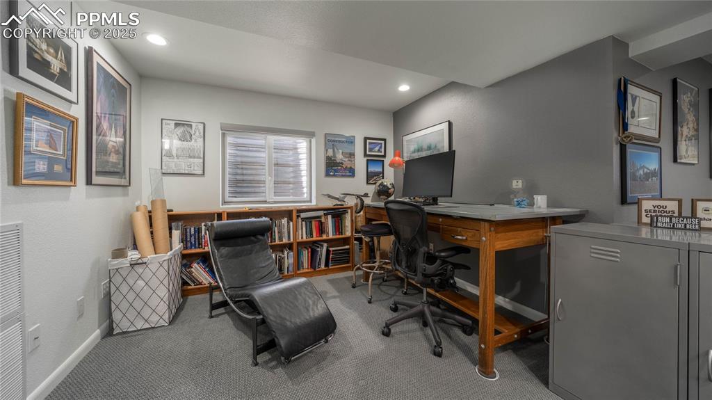 7550 Dairy Ranch Road Colorado Springs, CO 80919 - Photo 26 of 39 a view of a workspace with furniture