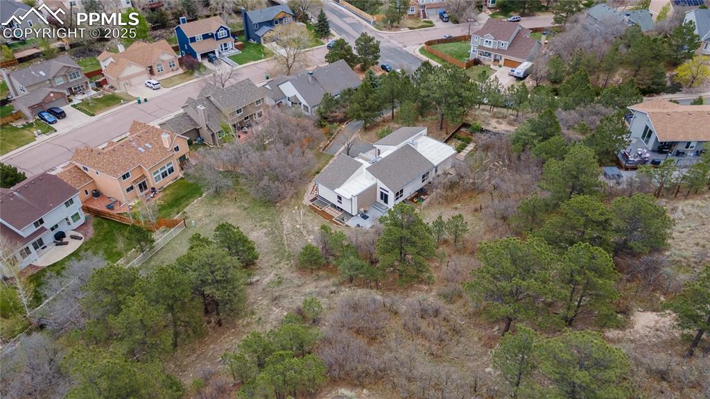7550 Dairy Ranch Road Colorado Springs, CO 80919 - Photo 34 of 39 an aerial view of residential house with outdoor space
